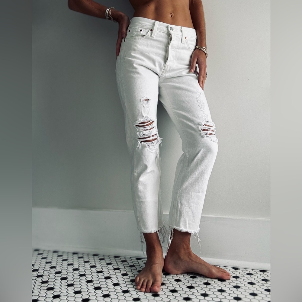 Levi’s distressed white wedgie straight ankle jeans